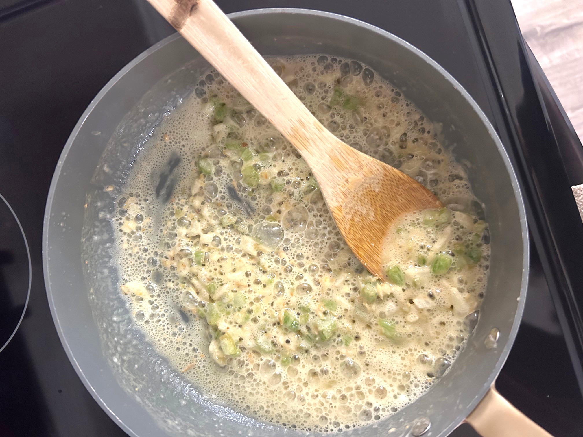 a pan over cooked celery and onions with some flour added in to thicken with bubbles as it cooks